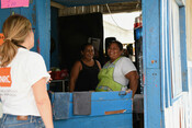 Workers at food bar speak with NRC staff