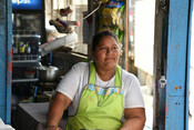 Woman working in food bar