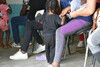 A family with young children wait at the transit centre in Danli, Honduras