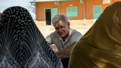 Jan Egeland discussing with women from the host community